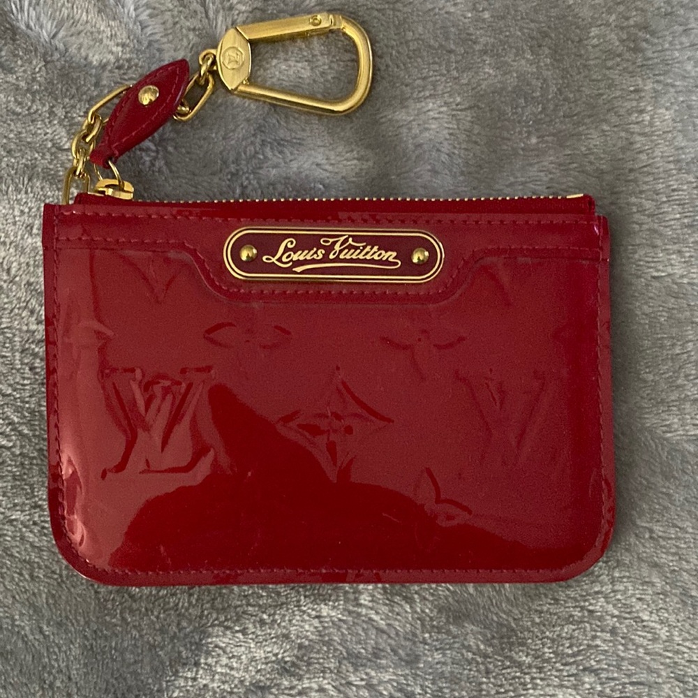 Louis Vuitton coin pouch.